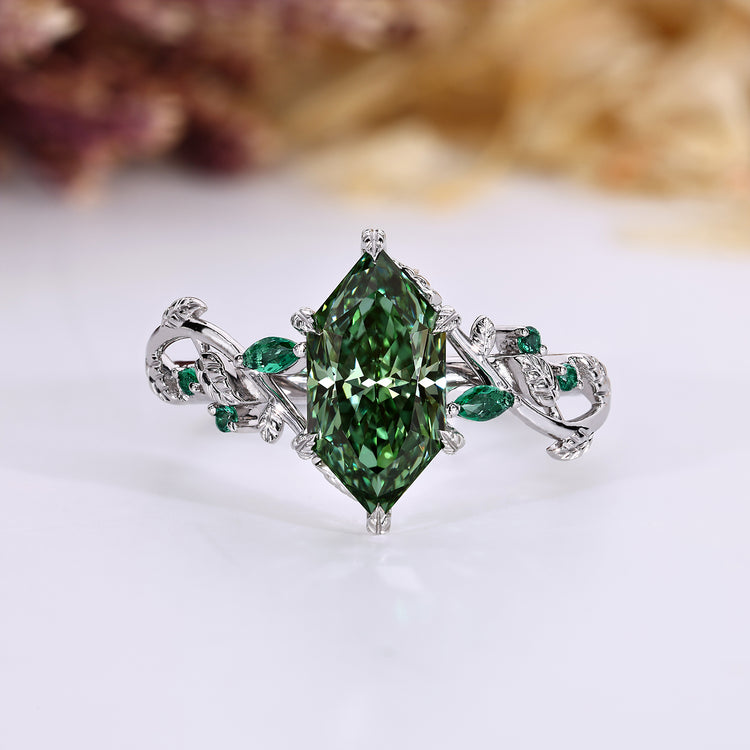 Dutch marquise diamond ring with green diamond.