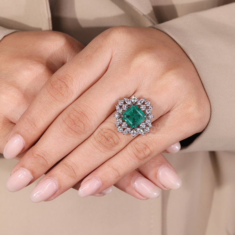 Asscher gemstone ring emerald marquise stones design.