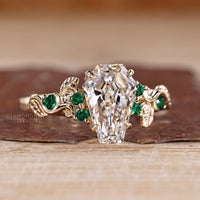 Nature inspired coffin diamond ring claw prong.