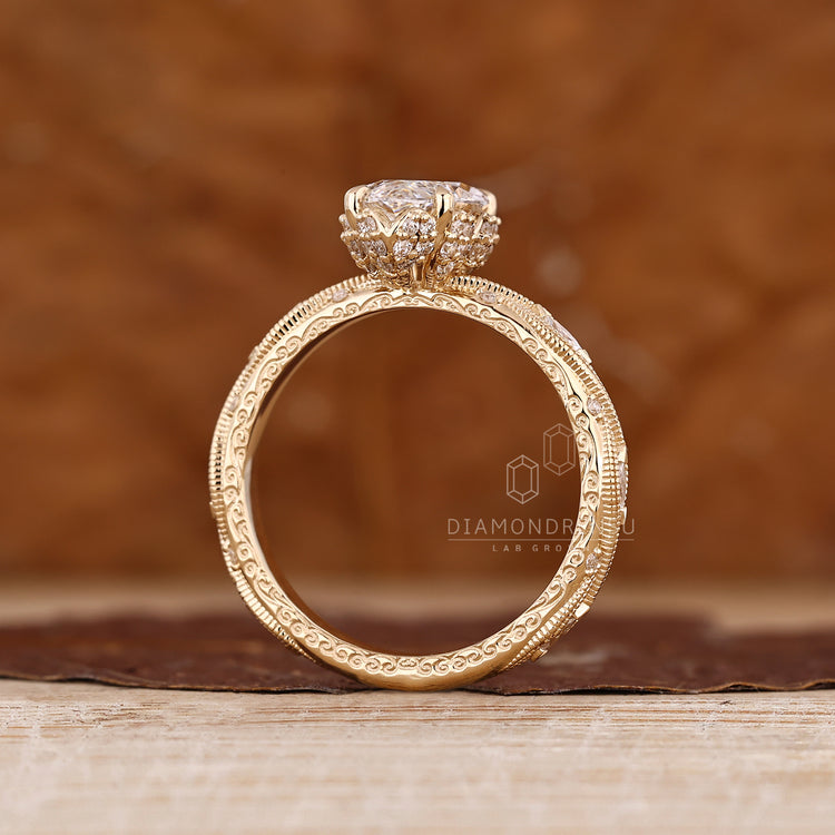 Marquise diamond ring round side stones vintage style.