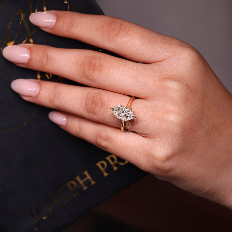 Lab grown Dutch marquise ring with bridge accent.