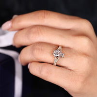 Coffin cut ring six prong pave setting style.