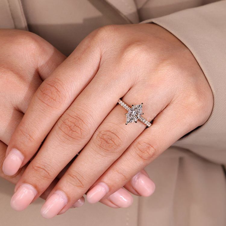 Round diamond pave Dutch marquise ring style.