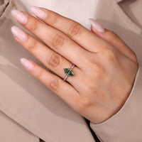Green diamond Dutch marquise solitaire ring.