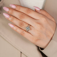 Lab grown marquise diamond ring with side stones.
