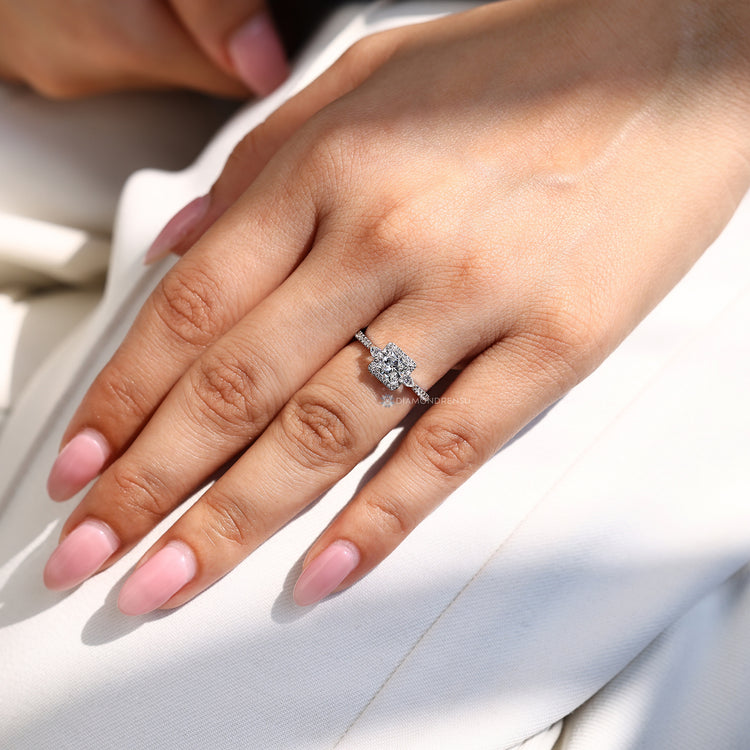 Princess cut ring round diamond halo design.