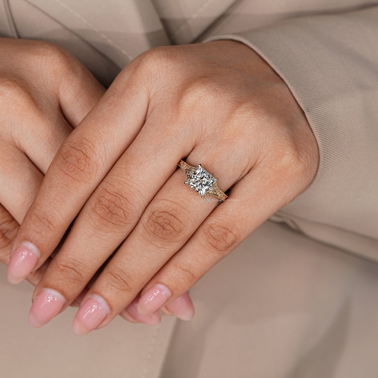 Vintage princess cut ring with four claw setting.