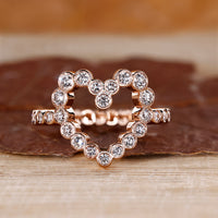 Bezel diamond ring with round diamond centre.