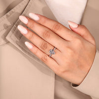 Coffin cut diamond ring four heart prong cathedral.