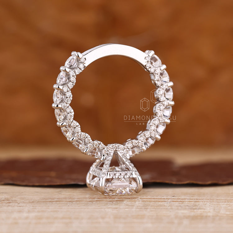 IGI certified lab diamond radiant ring, u prong pave.