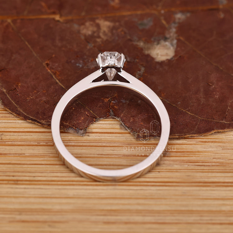 Coffin Cut Diamond Ring, IGI certified and featuring a Halo so Magnificent.