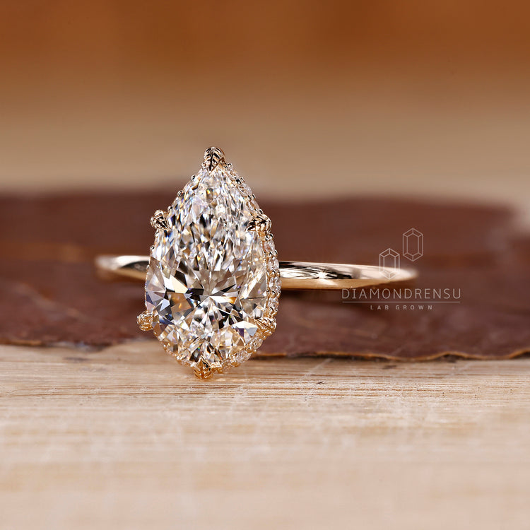 Diamondrensu AU handmade hidden halo engagement ring.