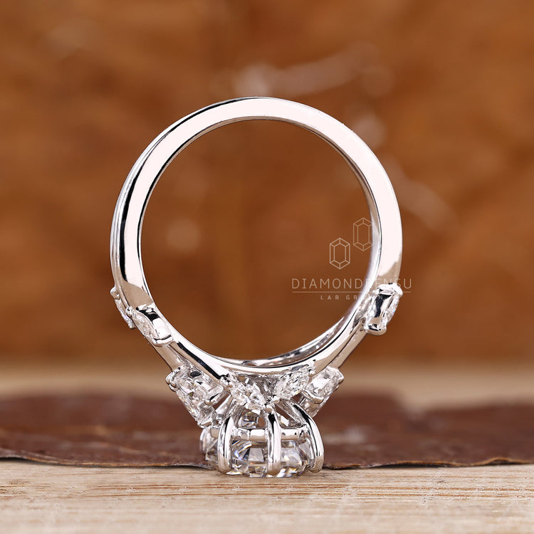 Coffin cut ring prong setting nature inspired.