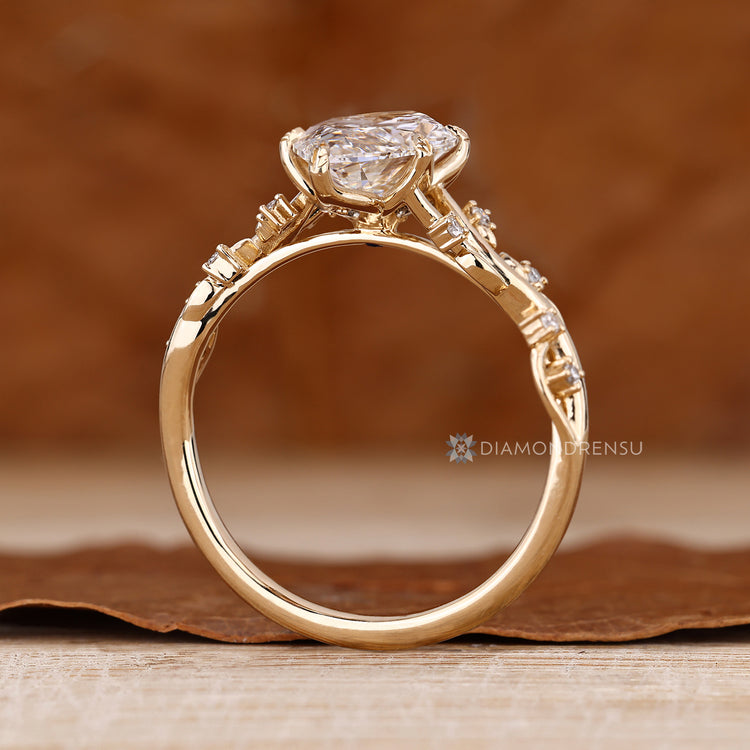 Marquise diamond ring cathedral tulip setting.