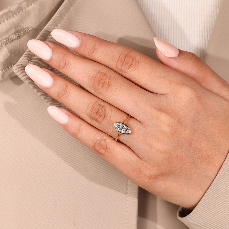Marquise diamond ring pinch shank IGI certified solitaire.