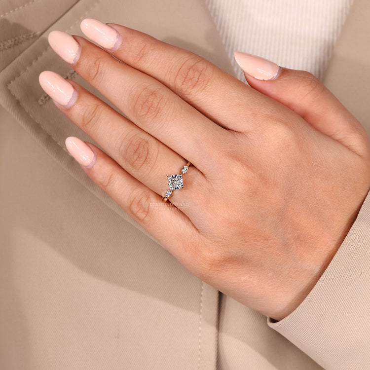 Cushion cut diamond ring IGI certified three stone set.