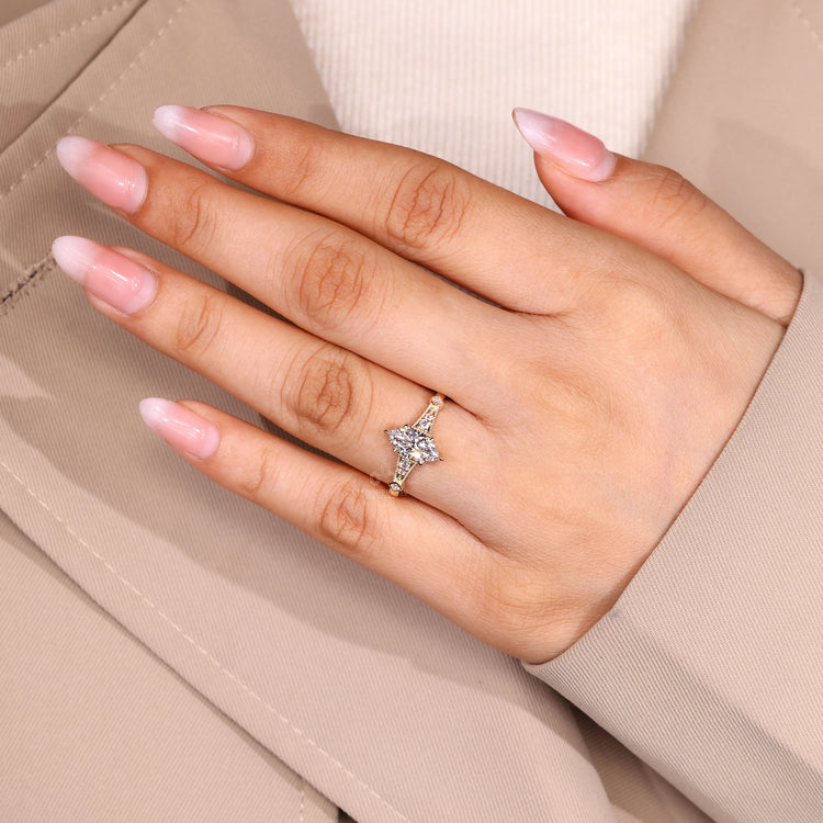 Marquise cut diamond ring IGI certified setting.