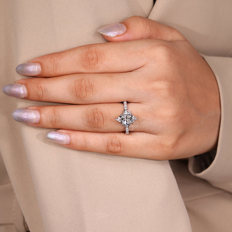 Shared prong marquise cut pave band ring.