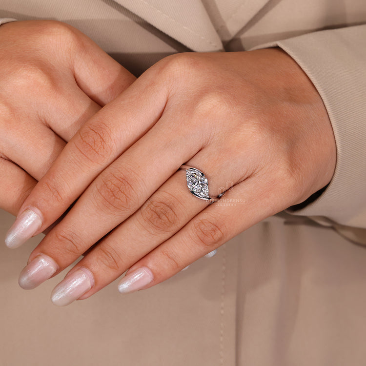Custom Engagement Ring featuring marquise diamond in bypass style.