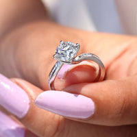 White gold ring designed with round cut diamond.