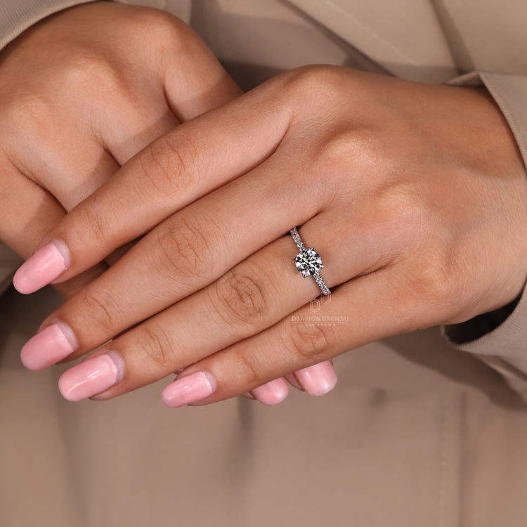 Designer round diamond pave engagement ring.