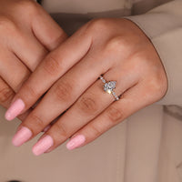 Designer pear shaped diamond engagement ring.