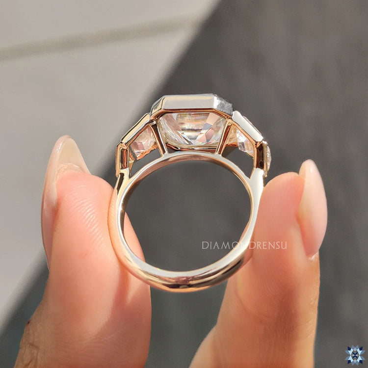 Asscher cut engagement ring in yellow gold, designed for elegance.