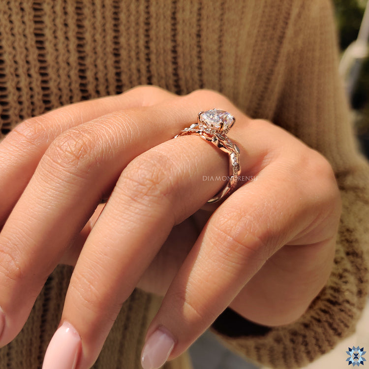 Handmade jewelry includes nature inspired oval engagement ring.