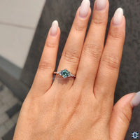 7 stone engagement ring offers perfect symmetry and brilliance.