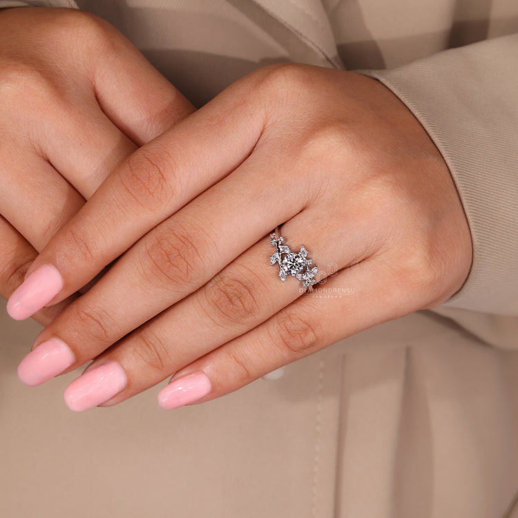 4 prong round cut diamond engagement ring.