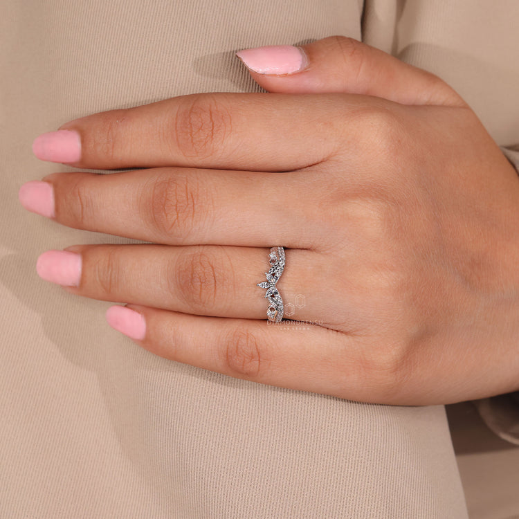 Round diamond band with marquise and round wedding band.