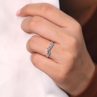 Round diamond band in chevron band style.