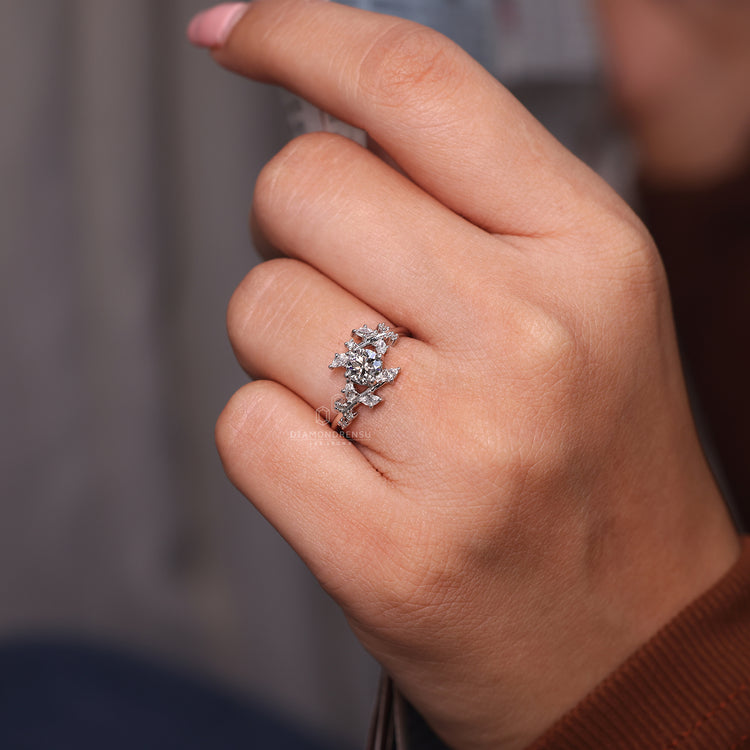 Designer round and marquise diamond ring.