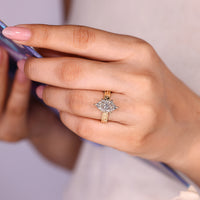 Dutch marquise ring milgrain setting round diamonds.