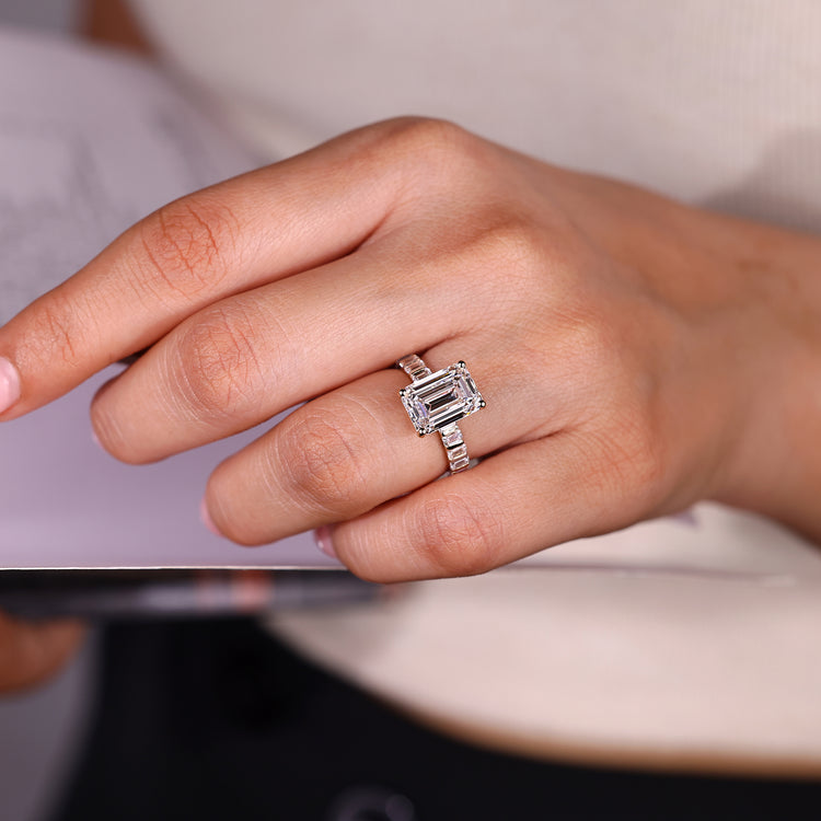 Emerald Cut Diamond Ring four prong setting design.