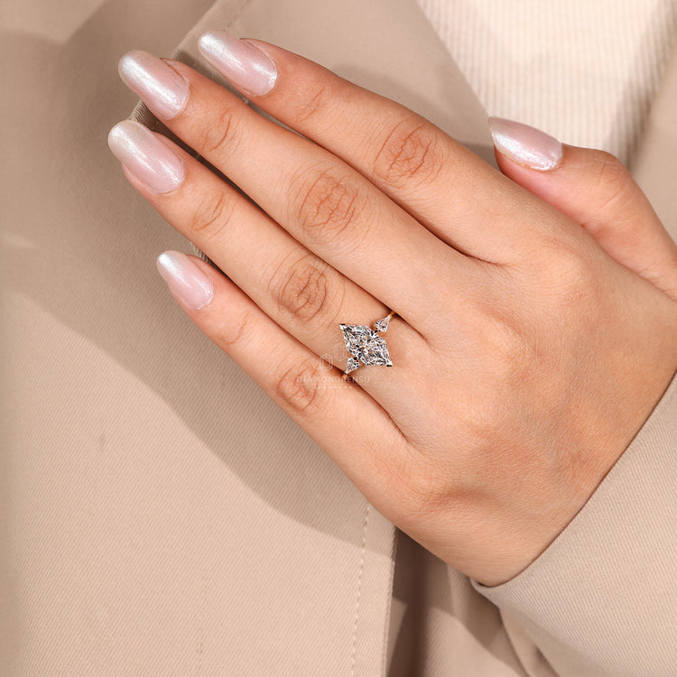 Kite Cut Diamond Ring with claw prongs and tapered shank.