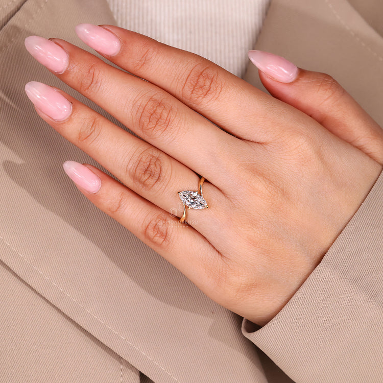 Marquise Old European Cut Ring refined prong setting.