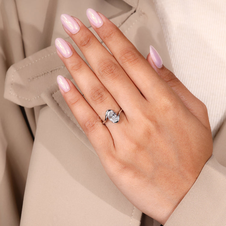Lab grown oval diamond solitaire engagement ring.
