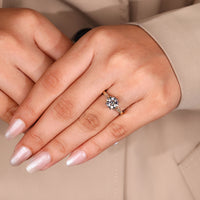 Cathedral Setting Ring featuring an IGI certified center stone.