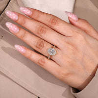 Oval Cut Diamond Ring cathedral four prong style.