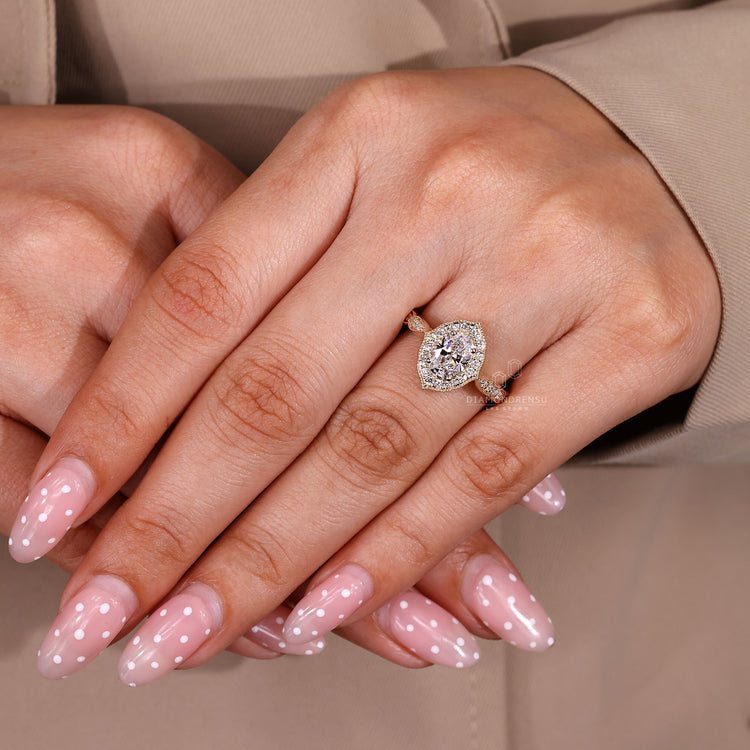 Oval Cut Diamond Ring with round pave accents.