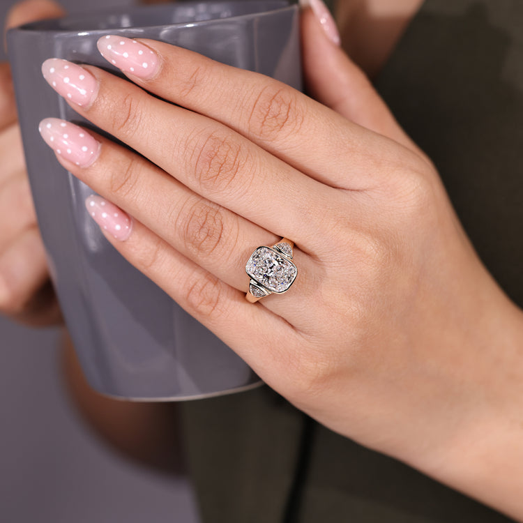 Cushion Cut Diamond Ring cathedral setting design.