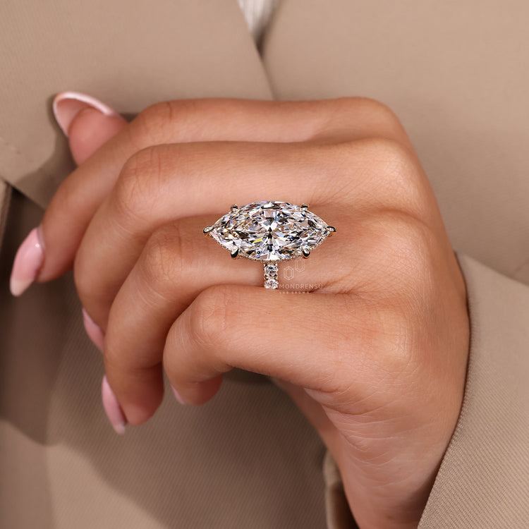 Six claw prong setting marquise diamond engagement ring.
