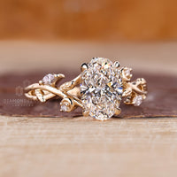 Oval cluster diamond ring in yellow gold diamond ring.
