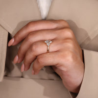 Lab grown marquise diamond ring in custom yellow gold setting.