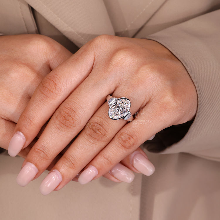 Three stone oval cut lab grown diamond ring.
