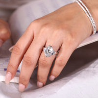 Bezel setting oval cut diamond ring handmade.