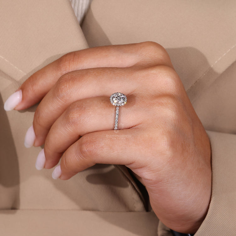 Designer white gold pave diamond engagement ring.