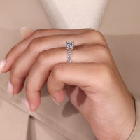 Round cut diamond ring and 4 prong setting.