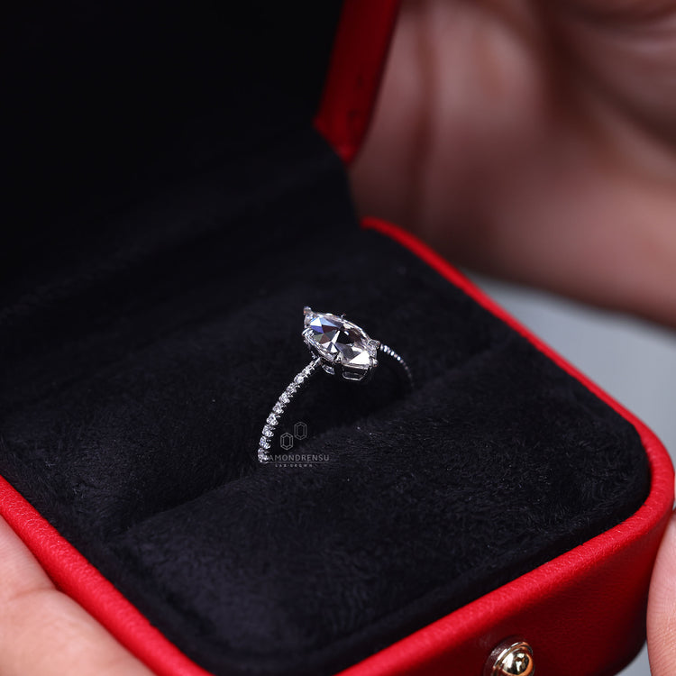 Round side diamond with pave setting ring.